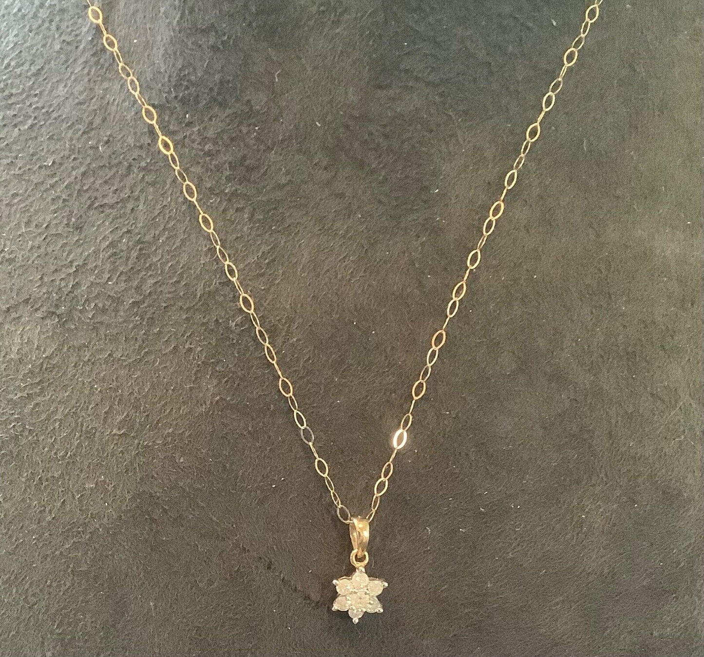 9ct Diamond floral cluster pendant on 16" fine trace chain yellow gold