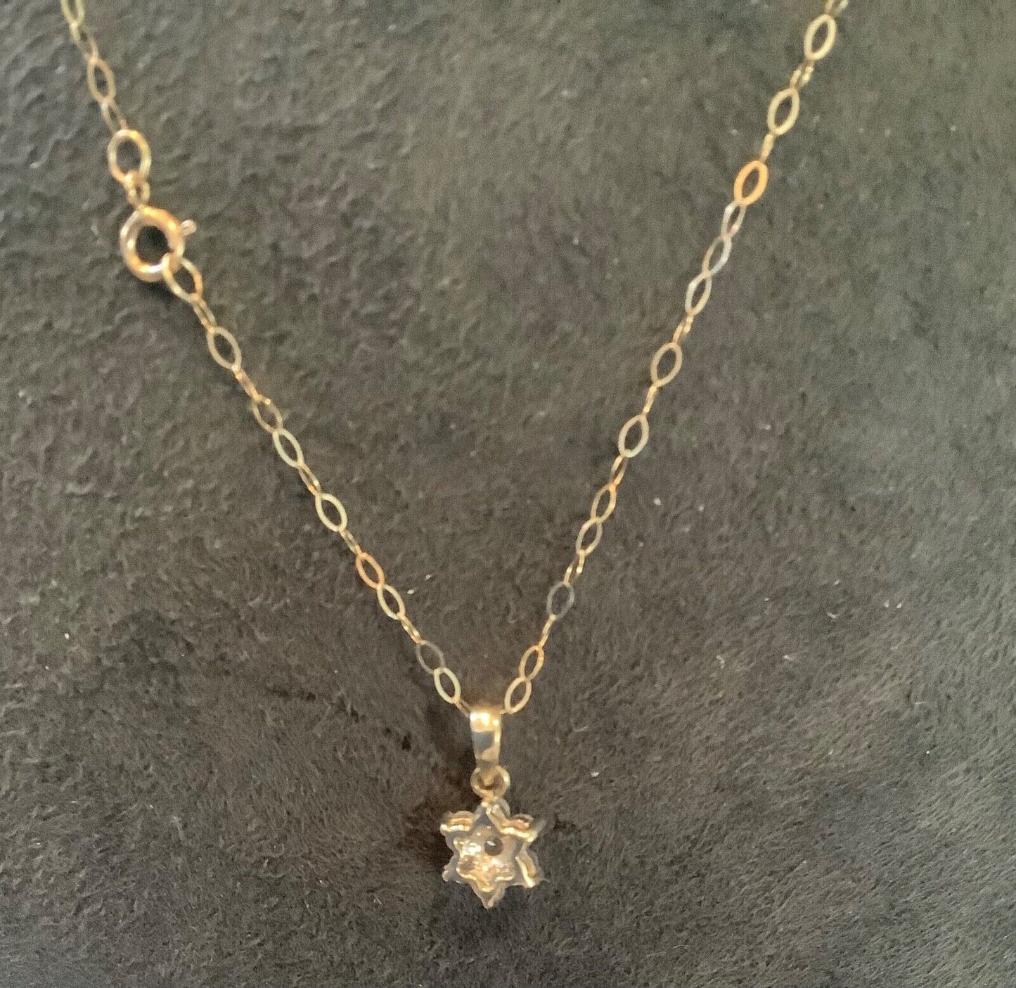 9ct Diamond floral cluster pendant on 16" fine trace chain yellow gold