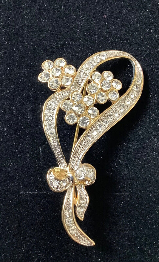 Adrian Buckley Pave Collection gold tone crystal flower on bow brooch