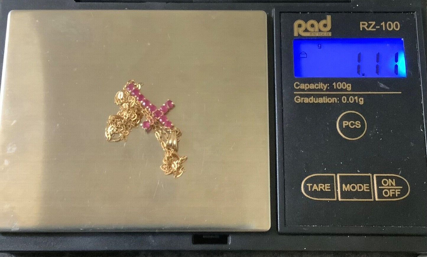 9ct ruby cross crucifix pendant on 16” fine 9ct trace chain yellow gold