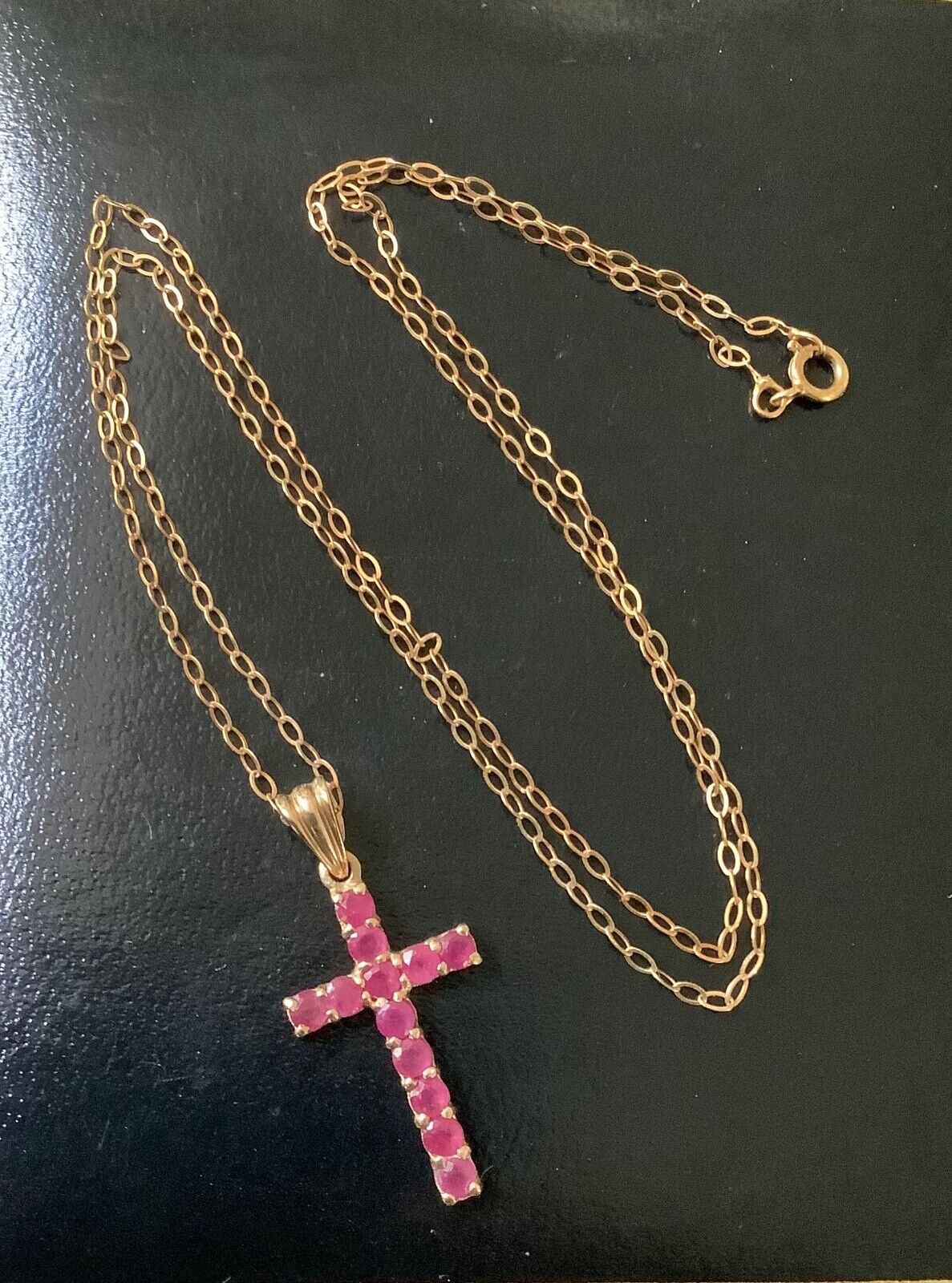 9ct ruby cross crucifix pendant on 16” fine 9ct trace chain yellow gold