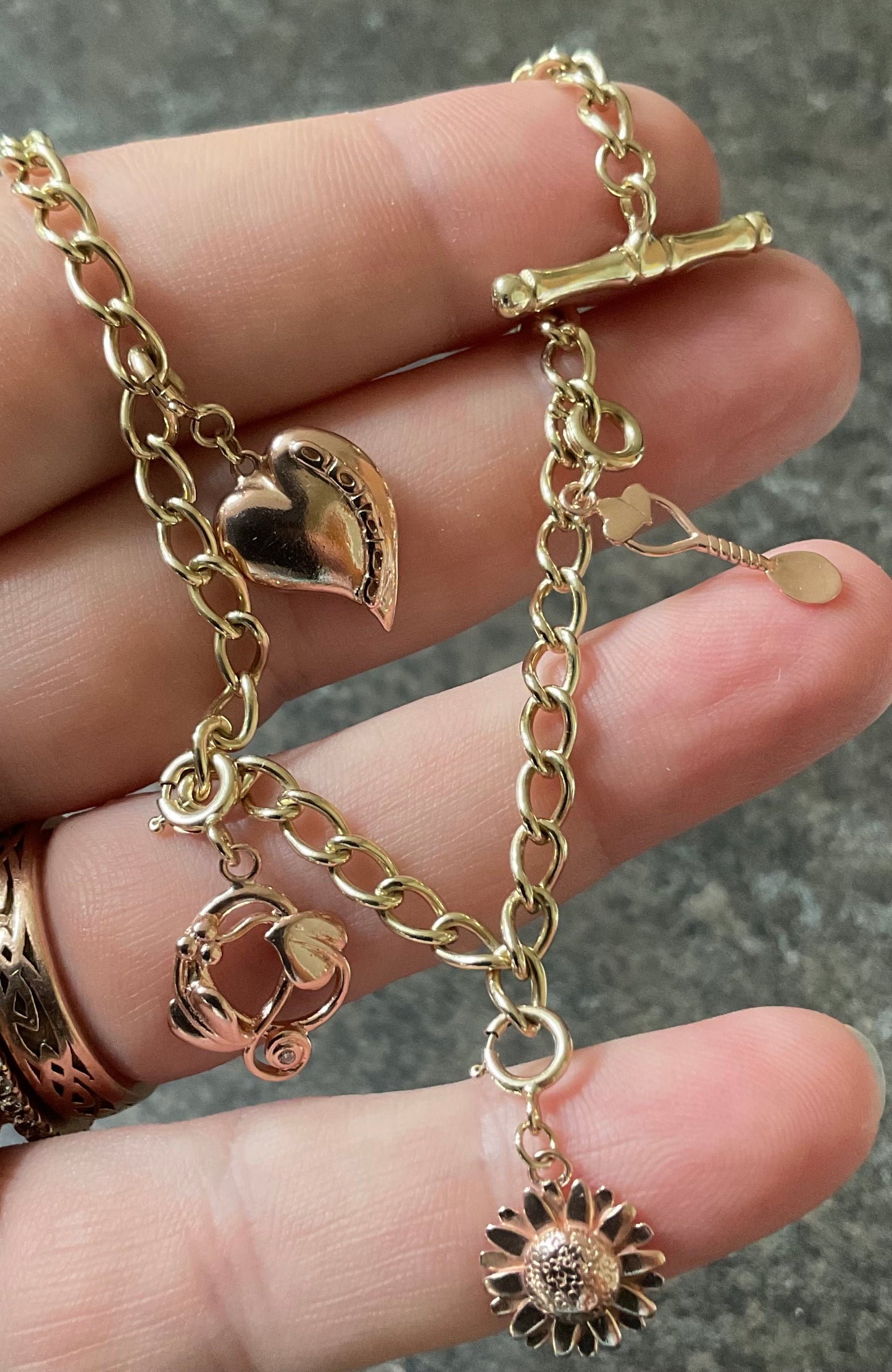 Vintage Clogau 9ct T-bar charm bracelet with 4 Clogau charms 19.5cm in yellow and rose gold