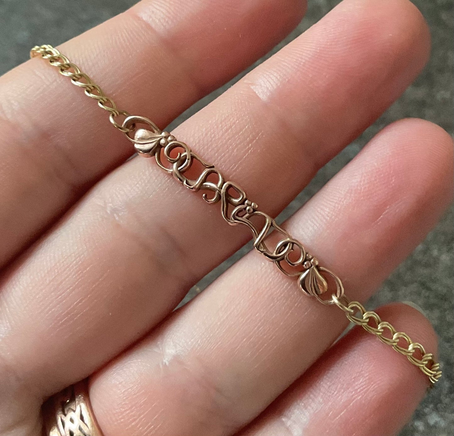 Vintage Clogau 9ct Cariad bracelet with safety padlock in yellow and rose gold