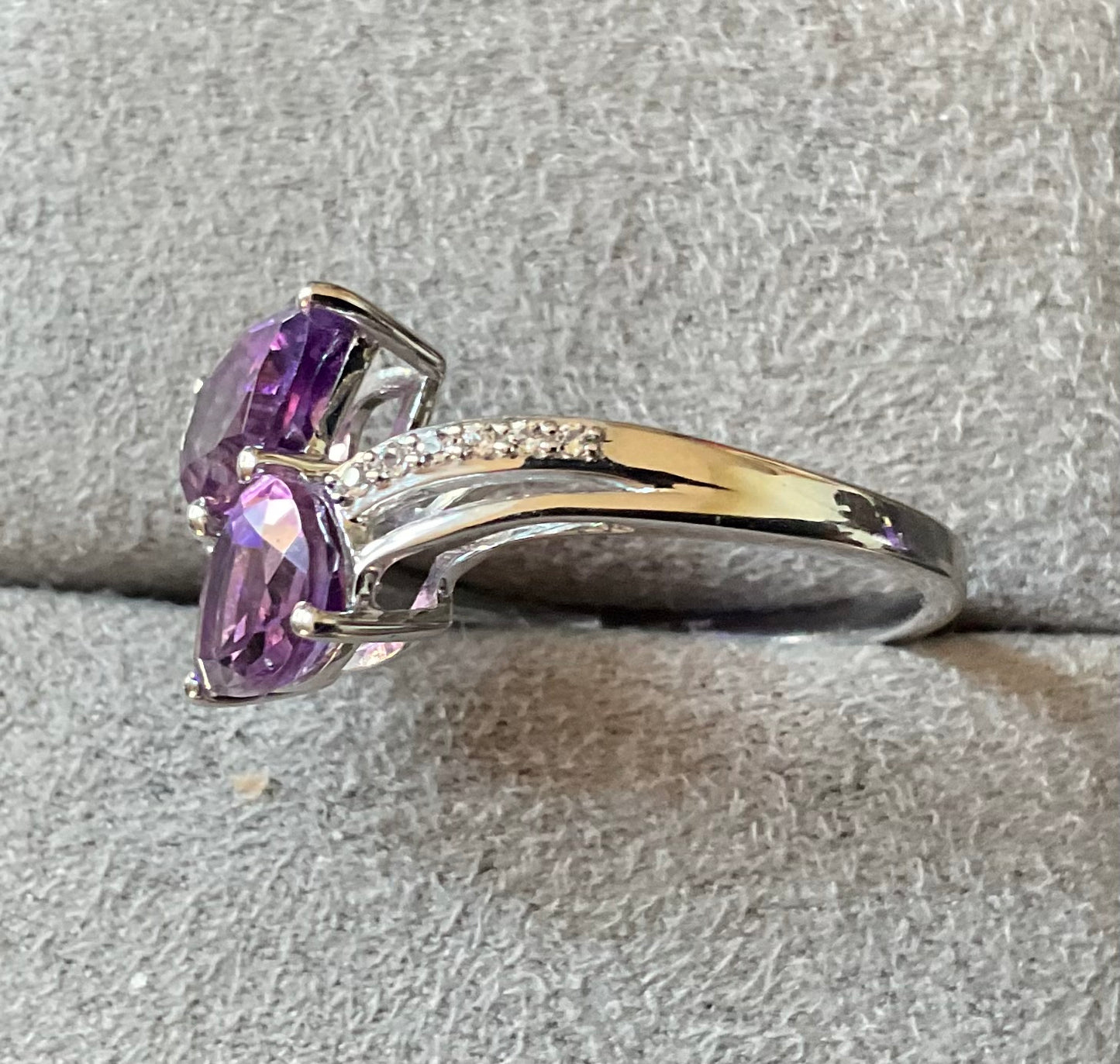 925 Amethyst pear cut 8x5mm bypass ring with clear gem set shoulders size P1/2
