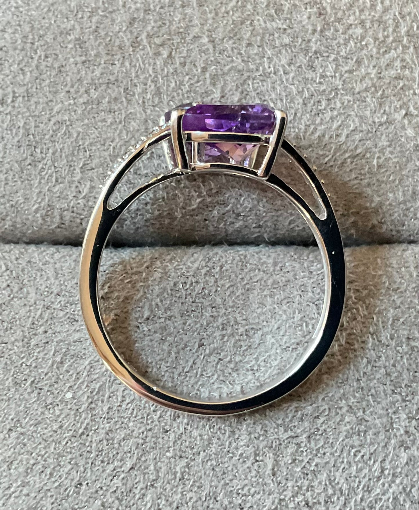 925 Amethyst pear cut 8x5mm bypass ring with clear gem set shoulders size P1/2