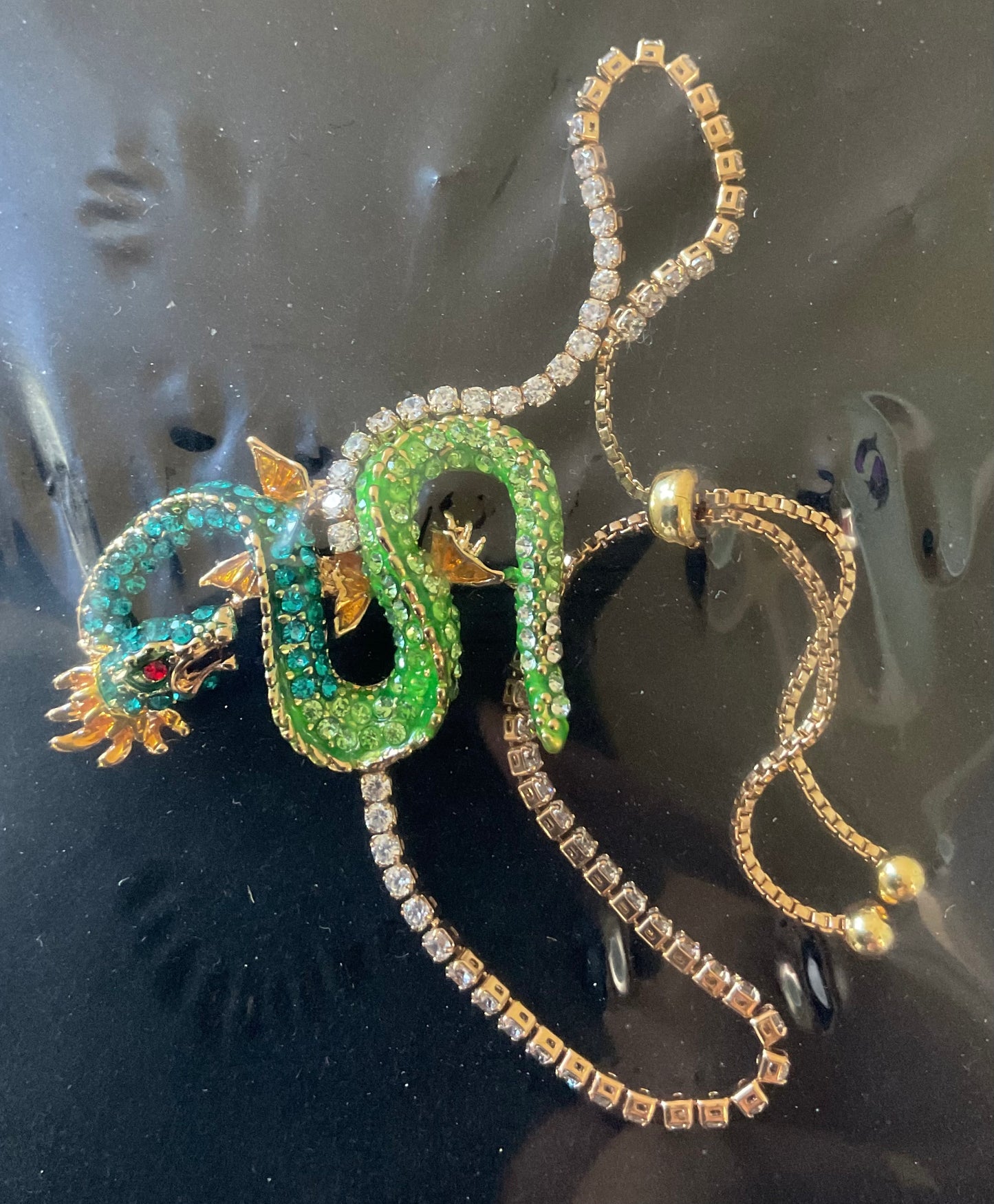 Butler and Wilson Serpentine Dragon blue and green crystal and enamel adjustable bracelet sealed in original box