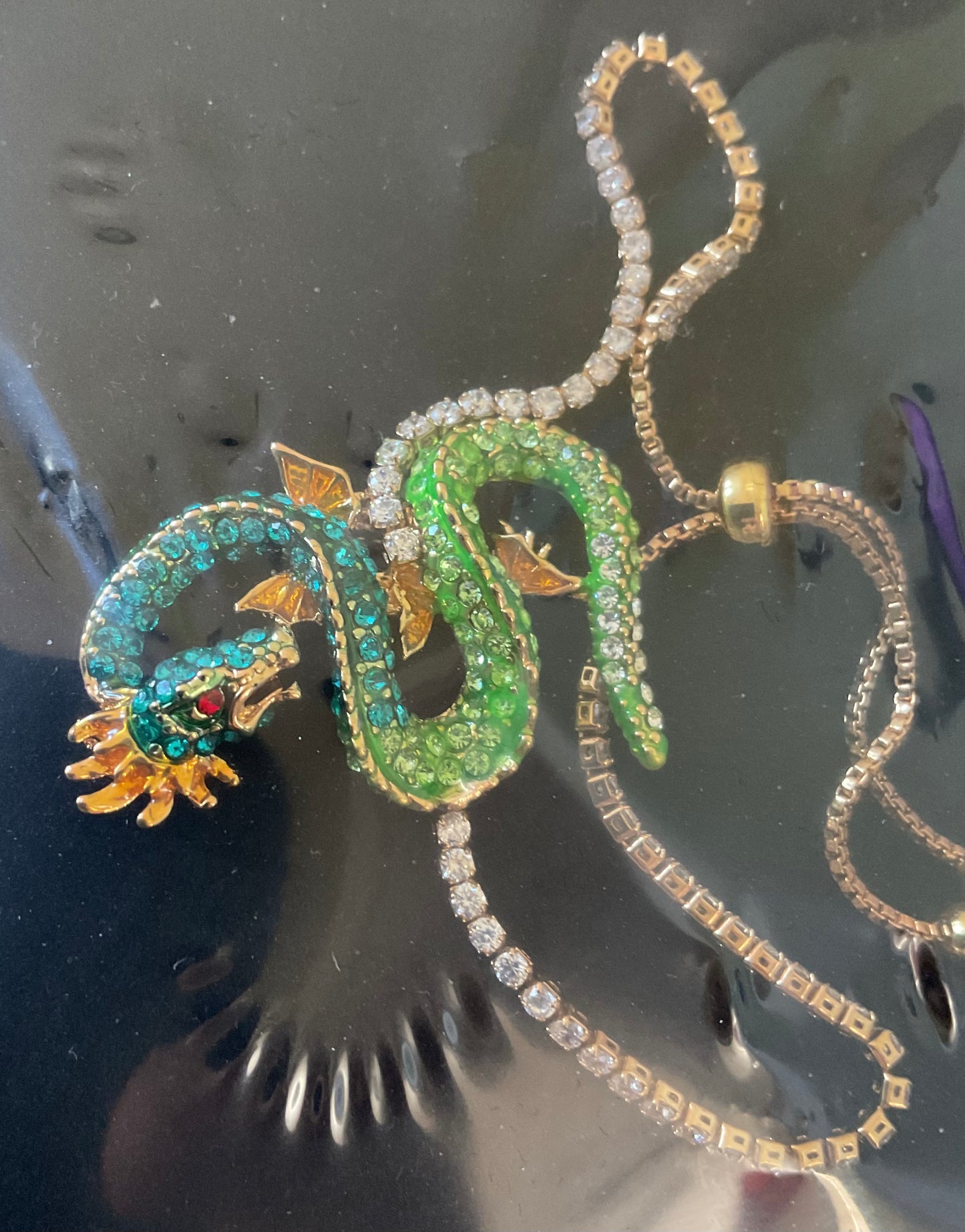 Butler and Wilson Serpentine Dragon blue and green crystal and enamel adjustable bracelet sealed in original box