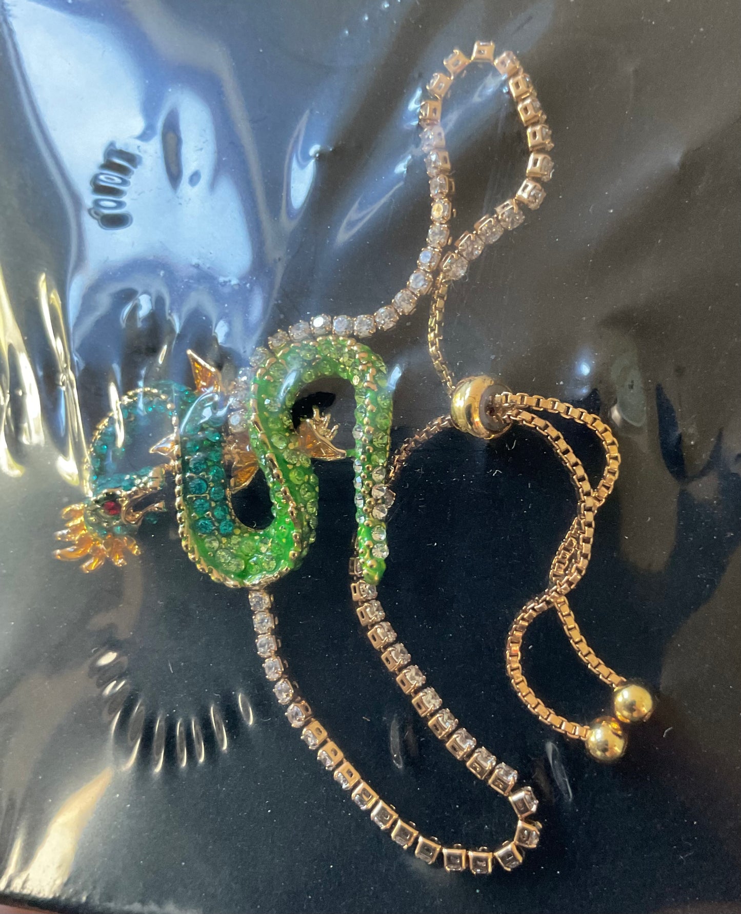 Butler and Wilson Serpentine Dragon blue and green crystal and enamel adjustable bracelet sealed in original box