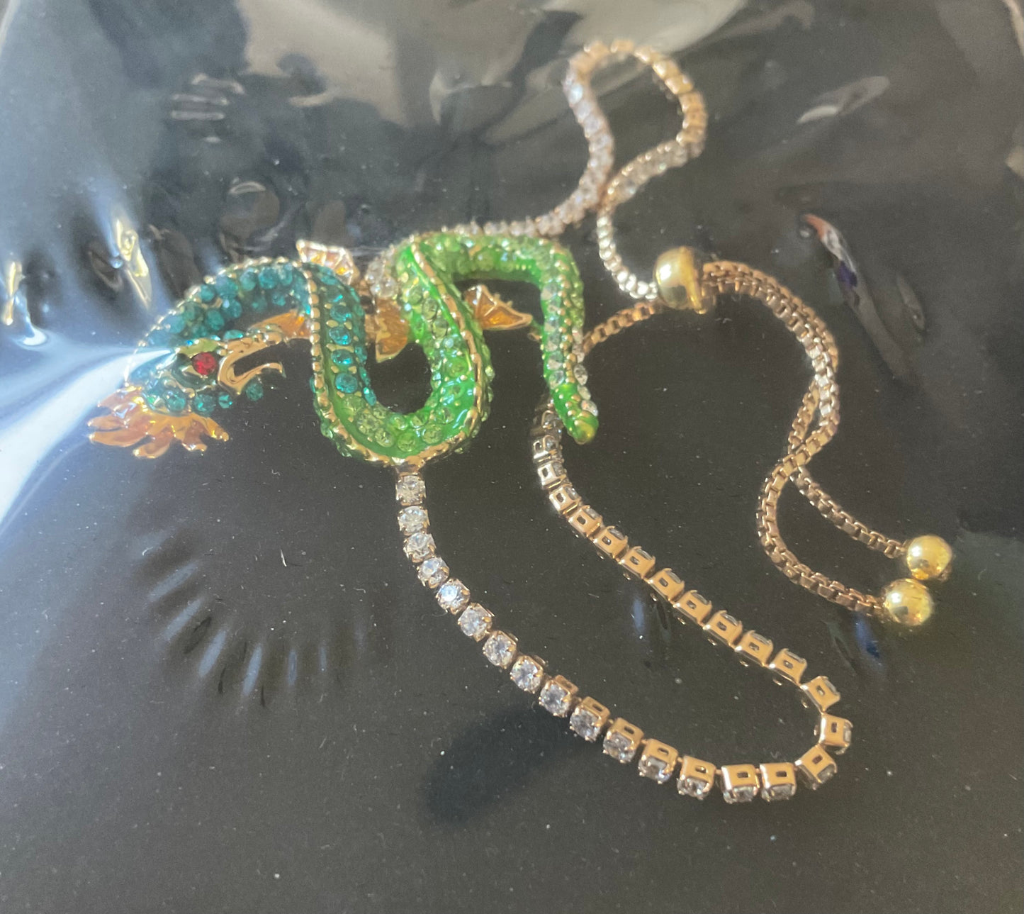 Butler and Wilson Serpentine Dragon blue and green crystal and enamel adjustable bracelet sealed in original box
