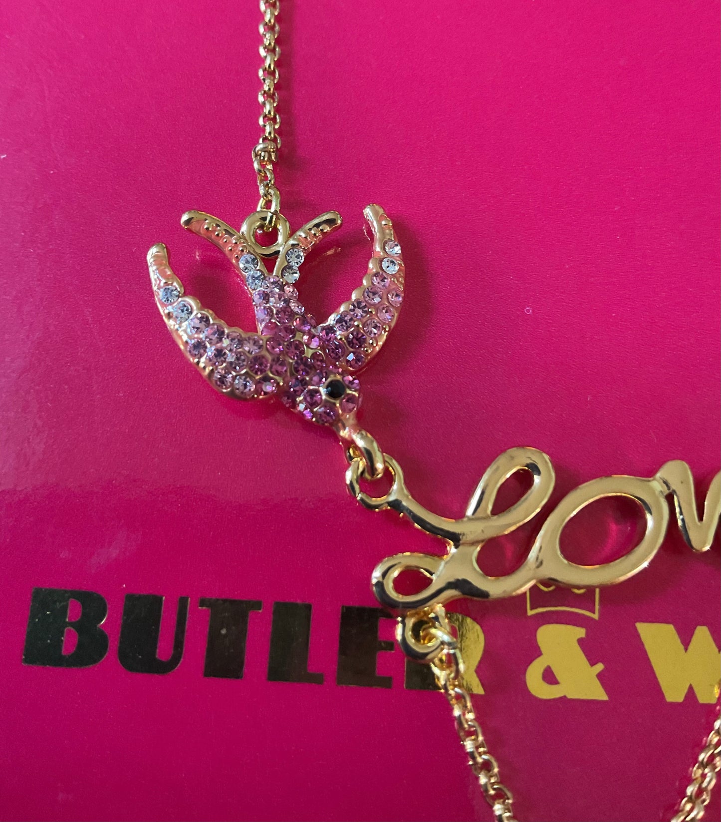 Butler and Wilson Pink Crystal Ribbon necklace with Swallows carrying the word ‘Love’