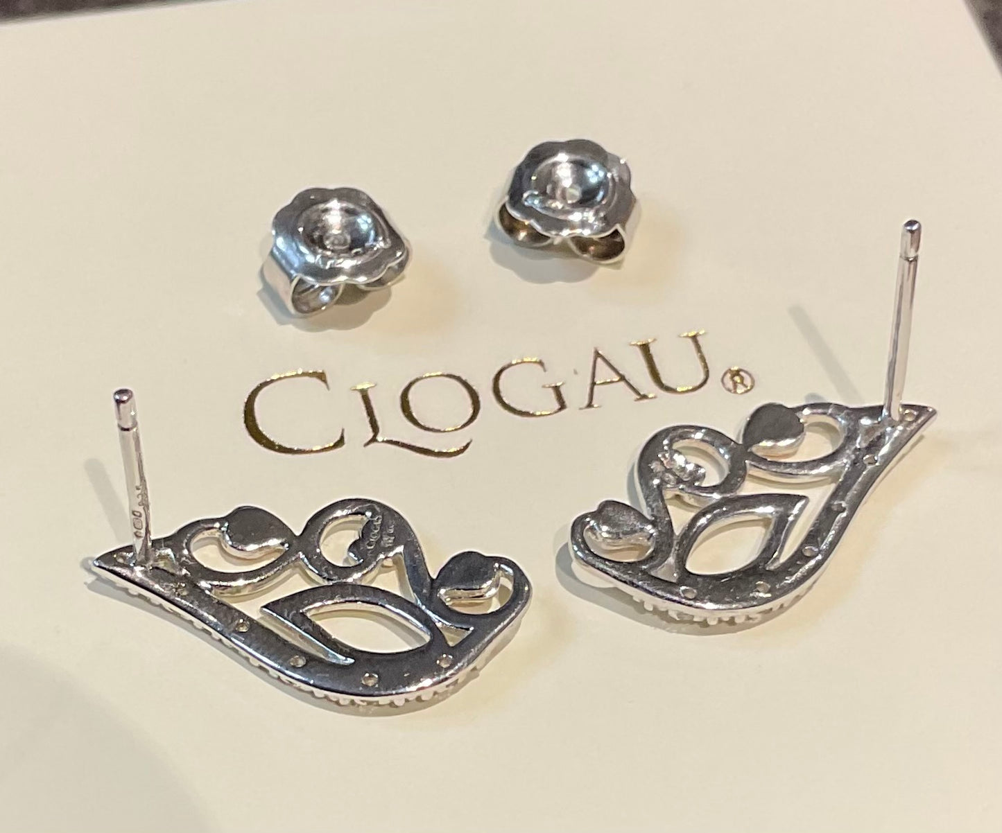 Clogau White Topaz Masque stud earrings in silver and rose gold
