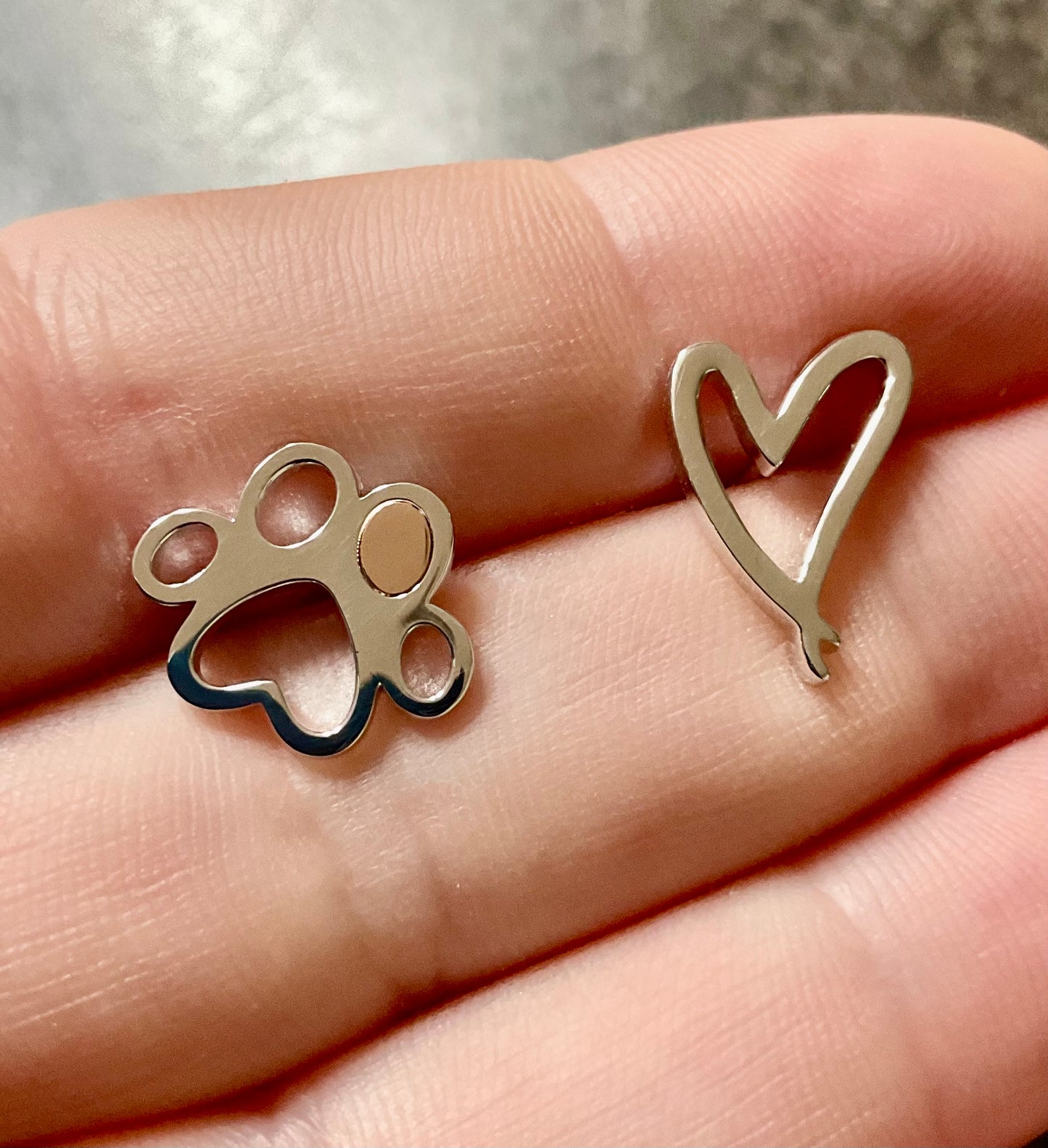 Clogau Paw Prints on my Heart stud earrings in silver and rose gold
