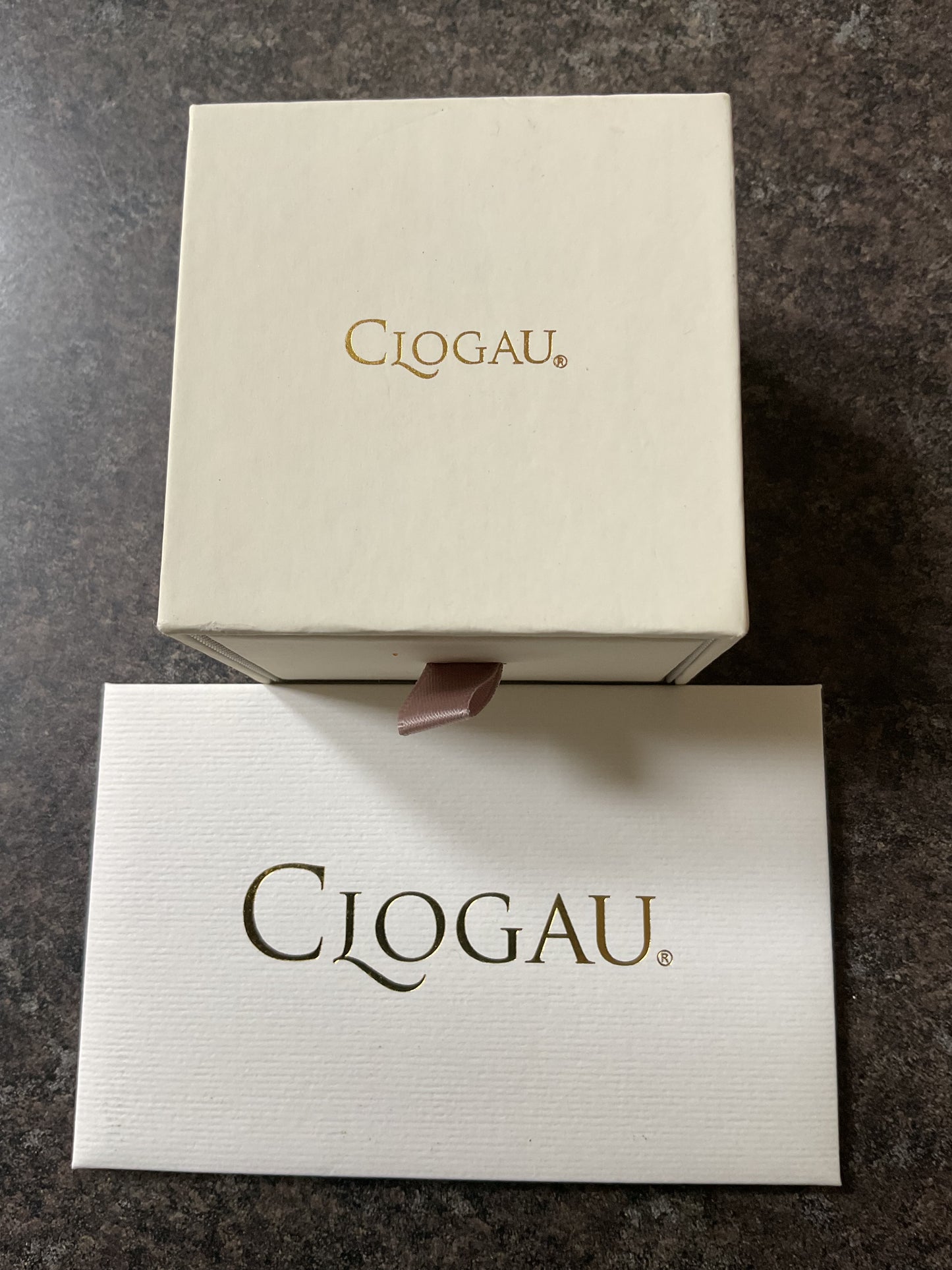 Clogau Paw Prints on my Heart stud earrings in silver and rose gold