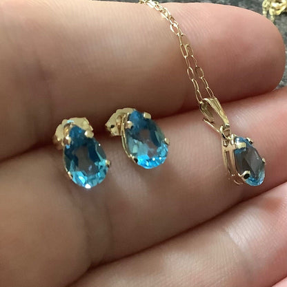 10K Blue topaz pendant 16” necklace and stud earring set yellow gold