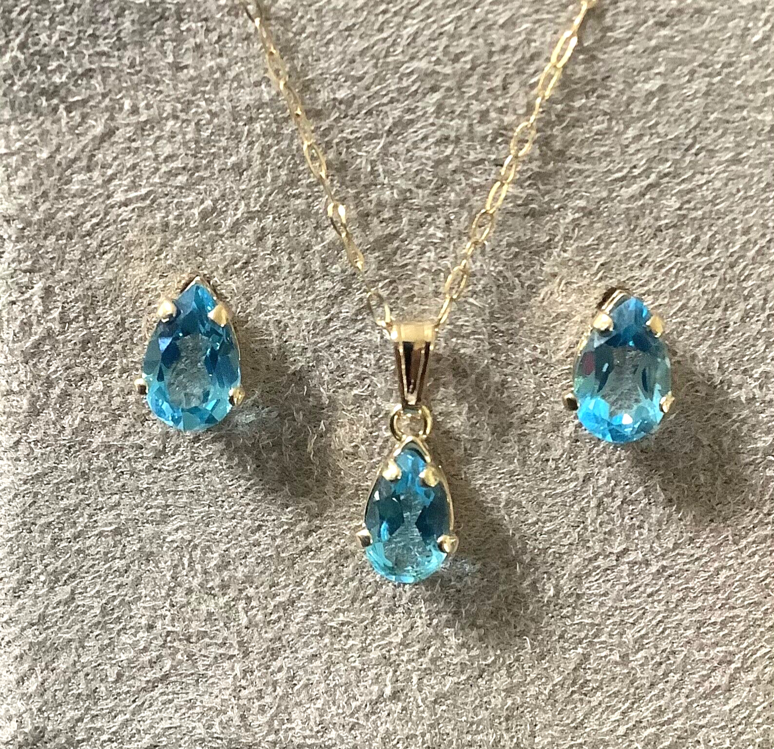 10K Blue topaz pendant 16” necklace and stud earring set yellow gold