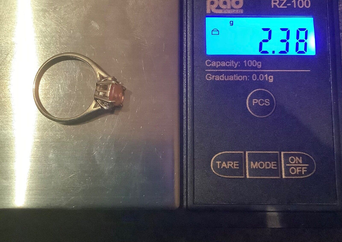 9ct pale orange gemstone ring with diamonds size N1/2 yellow gold