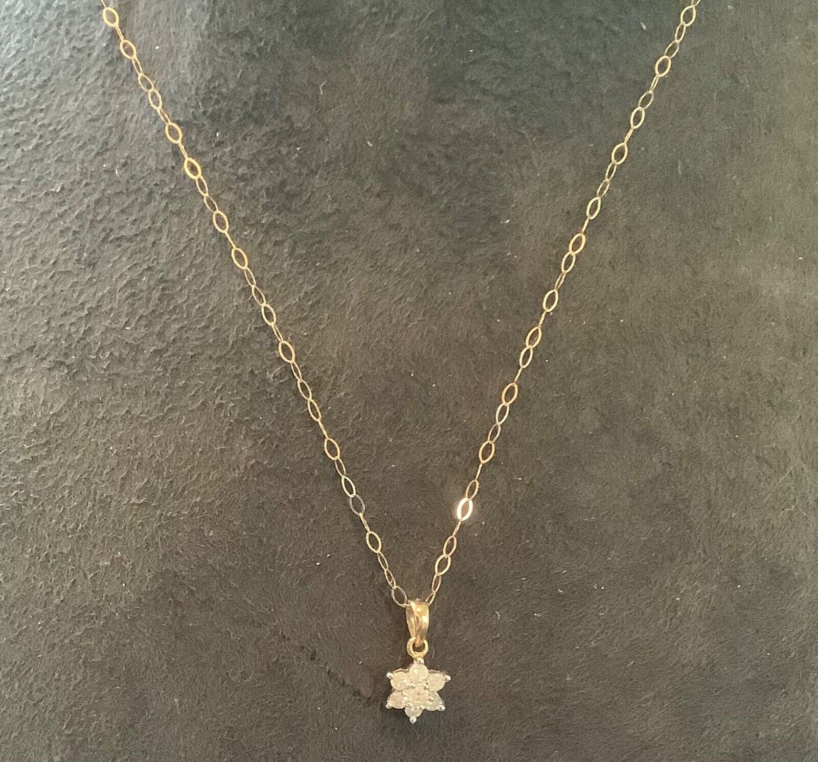 9ct Diamond floral cluster pendant on 16" fine trace chain yellow gold
