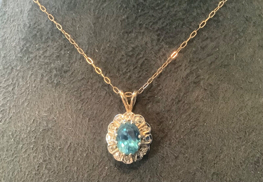 9ct Blue topaz and Diamond vintage halo cluster pendant on 16" 9ct trace chain