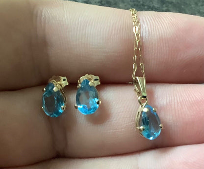 10K Blue topaz pendant 16” necklace and stud earring set yellow gold