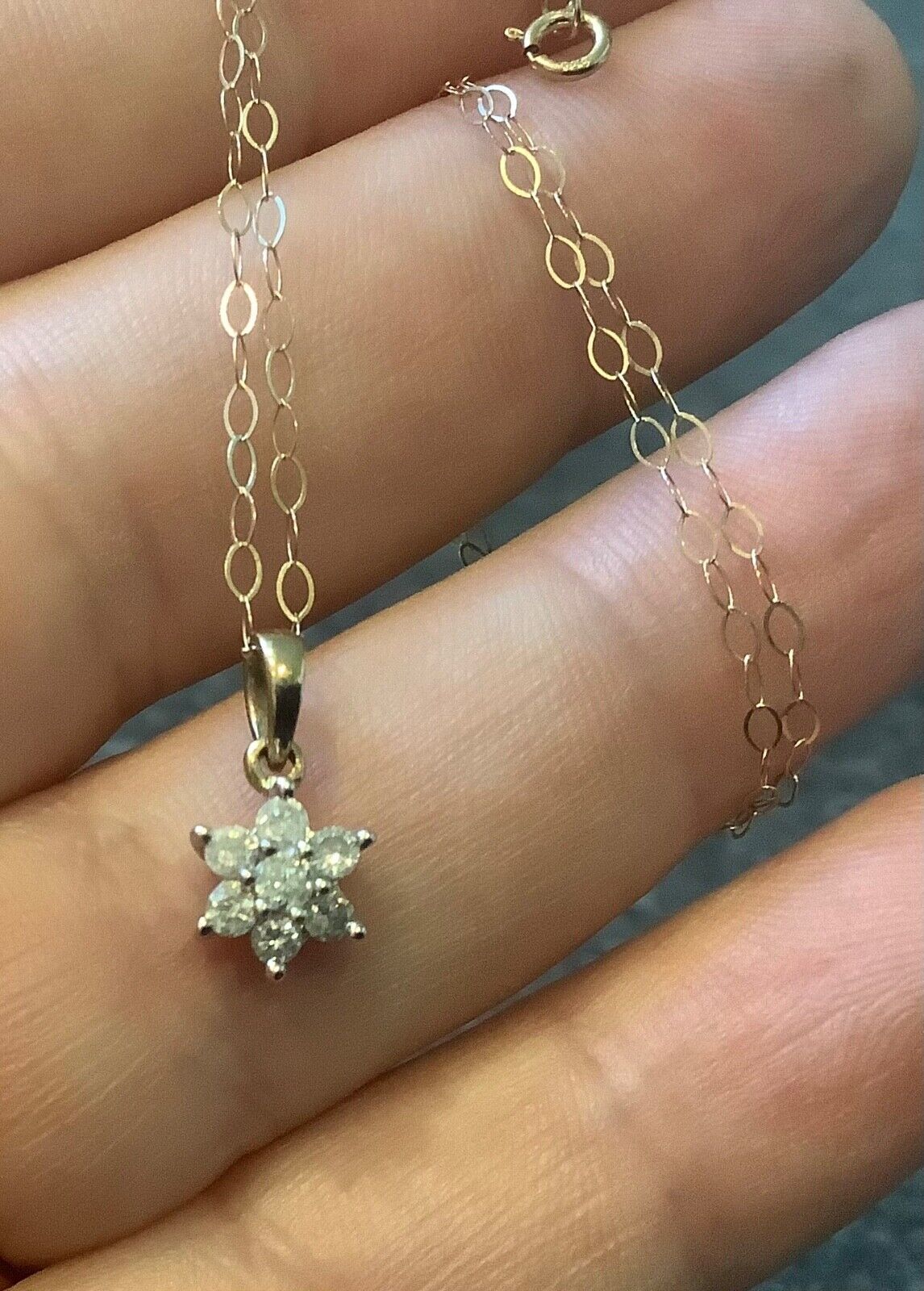 9ct Diamond floral cluster pendant on 16" fine trace chain yellow gold