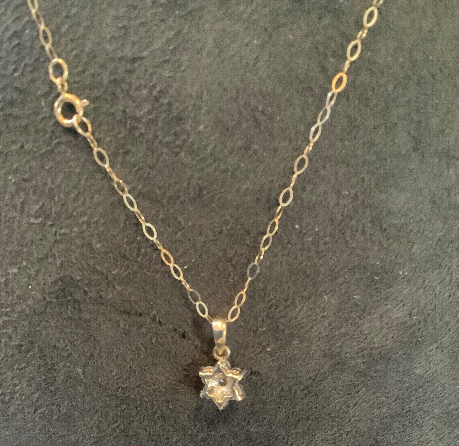 9ct Diamond floral cluster pendant on 16" fine trace chain yellow gold
