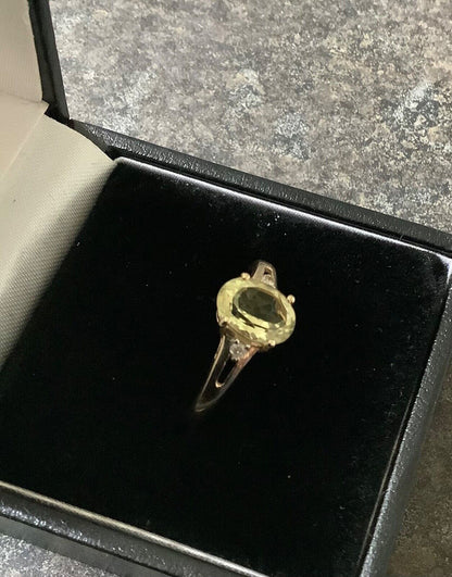 10k greenish yellow Beryl and diamond ring size N yellow gold