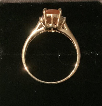 9ct pale orange gemstone ring with diamonds size N1/2 yellow gold