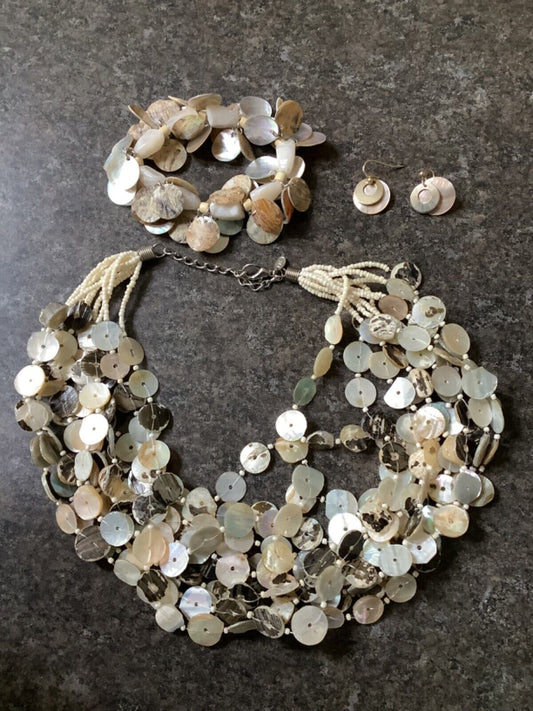 Multi strand shell necklace with shell bracelet and earrings set