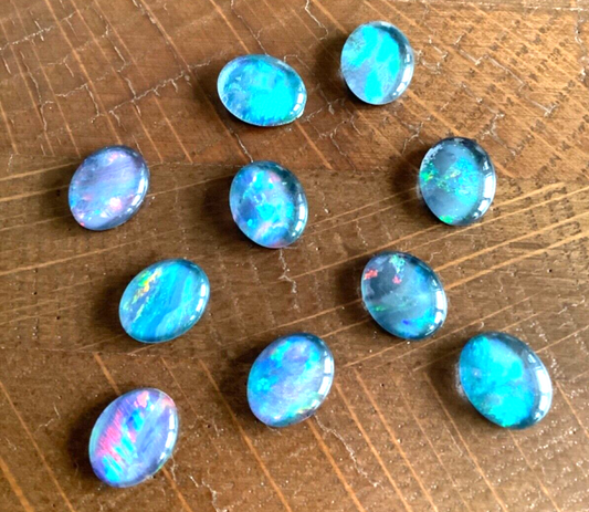 10 x triplet opal cabochons approximately 10x8mm reds greens yellows blues