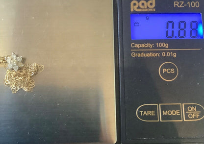 9ct Diamond floral cluster pendant on 16" fine trace chain yellow gold