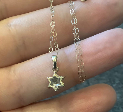 9ct Diamond floral cluster pendant on 16" fine trace chain yellow gold