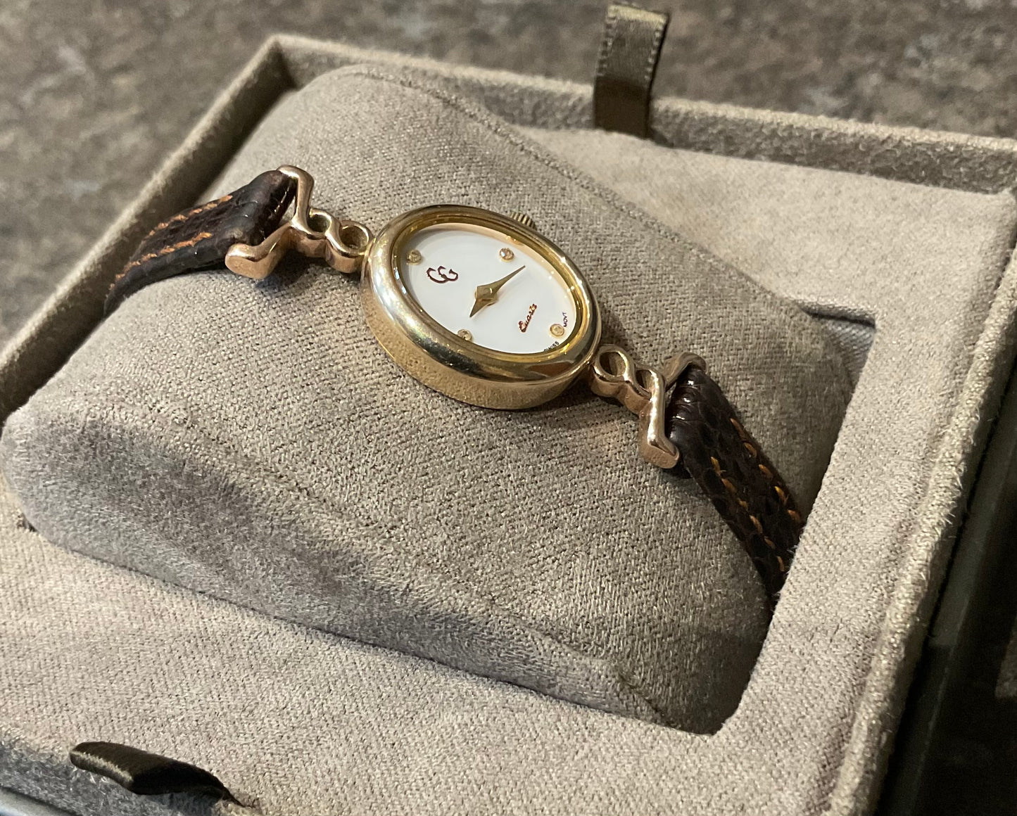 Ladies Clogau 9ct Diamond accent watch with original brown leather strap in yellow and rose gold new battery working