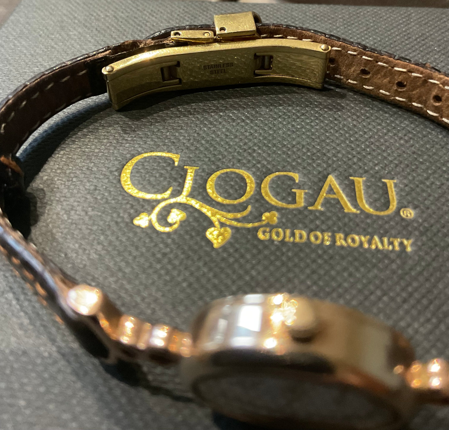 Ladies Clogau 9ct Diamond accent watch with original brown leather strap in yellow and rose gold new battery working