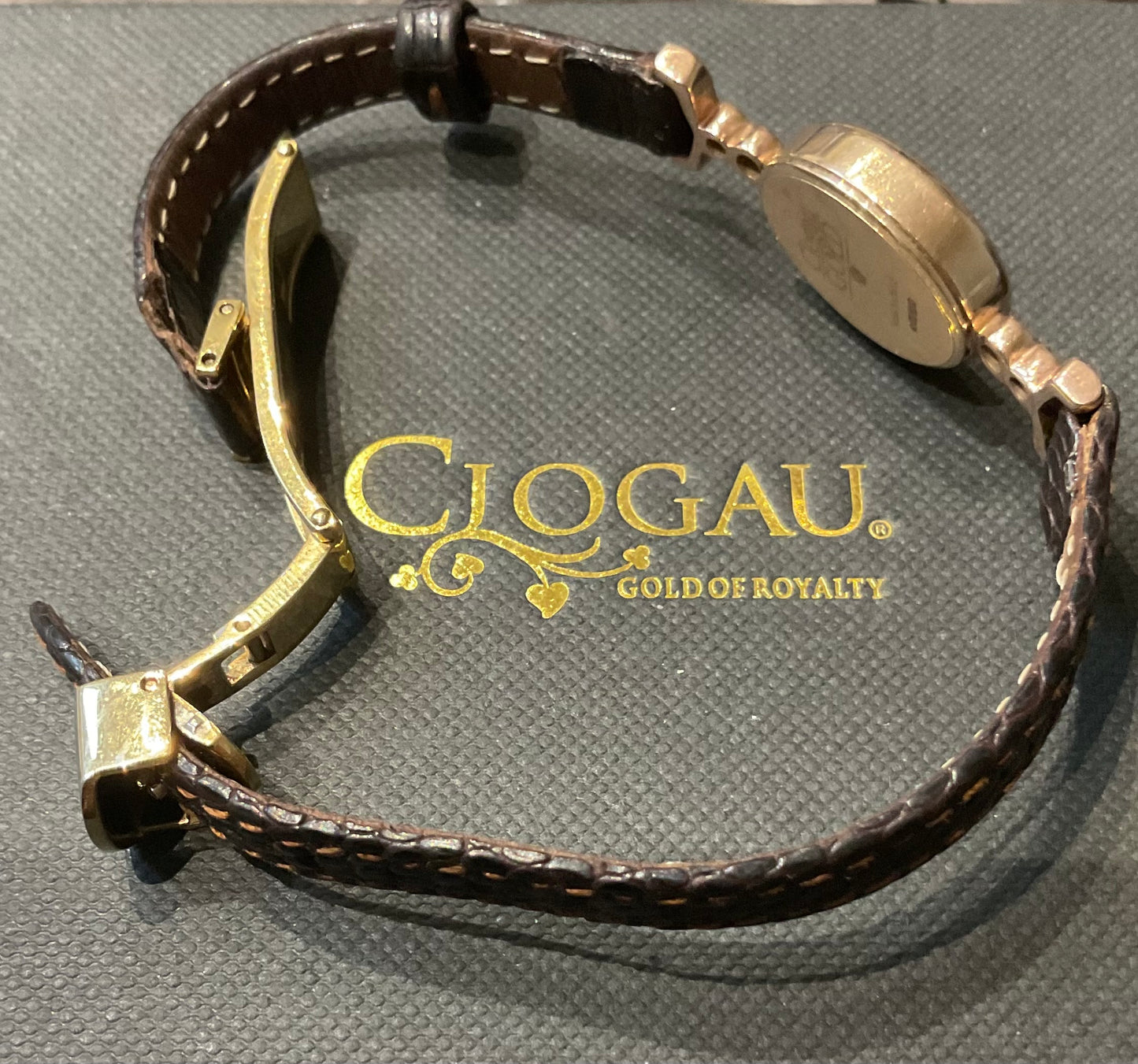 Ladies Clogau 9ct Diamond accent watch with original brown leather strap in yellow and rose gold new battery working