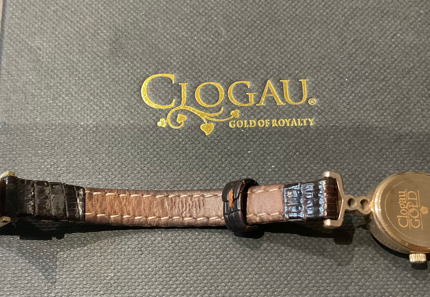 Ladies Clogau 9ct Diamond accent watch with original brown leather strap in yellow and rose gold new battery working