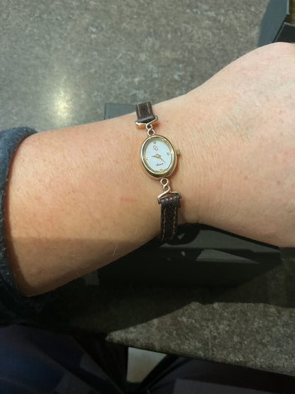 Ladies Clogau 9ct Diamond accent watch with original brown leather strap in yellow and rose gold new battery working