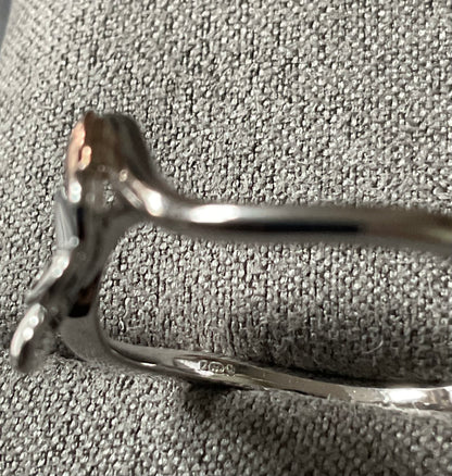 Cariad Pob Lwc Good Luck ring with white topaz in silver and rose gold sizes P and Q available