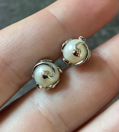 Clogau Caged Pearl stud earrings and Caged Pearl necklace in silver and rose gold