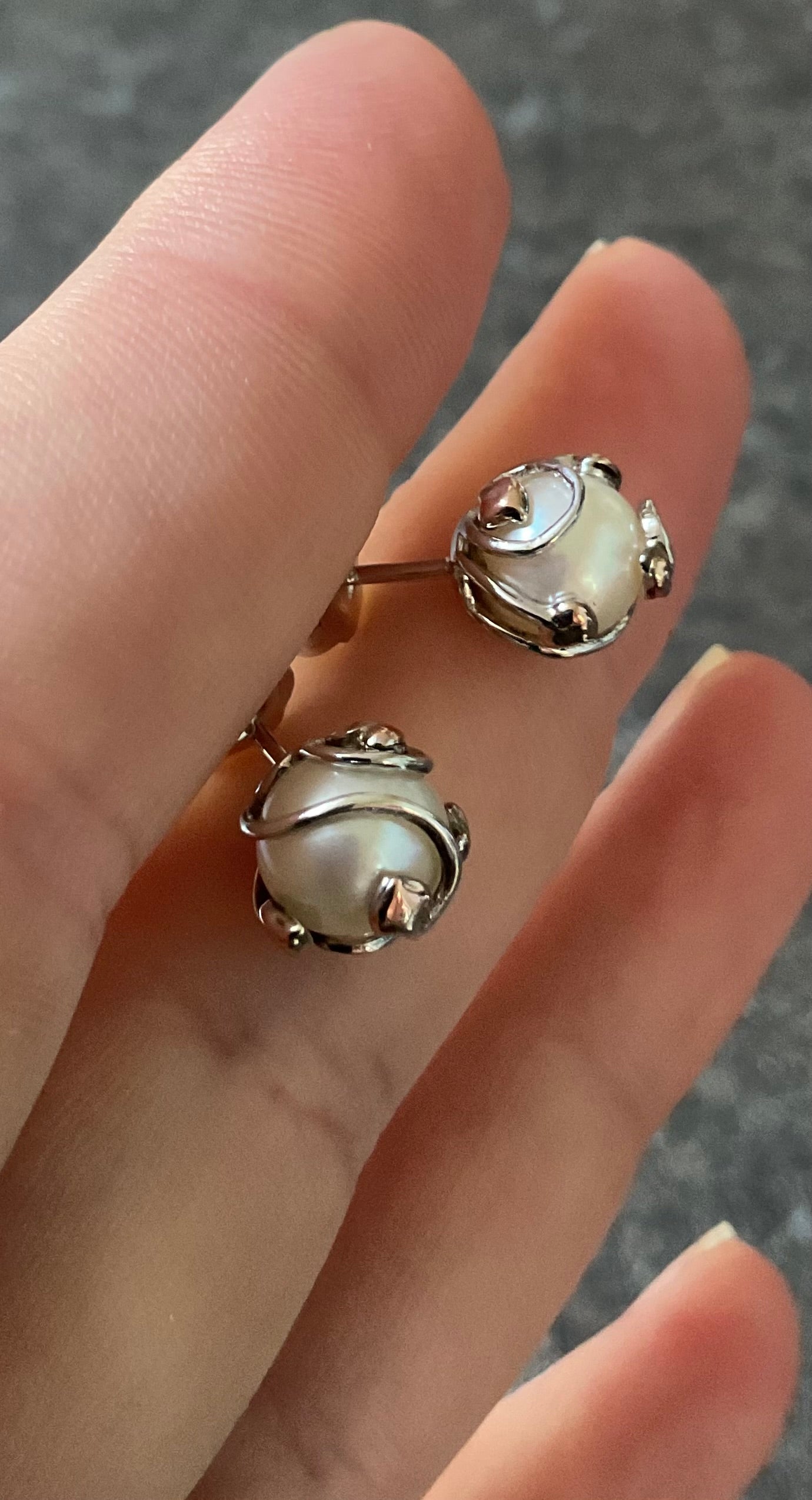 Clogau Caged Pearl stud earrings and Caged Pearl necklace in silver and rose gold
