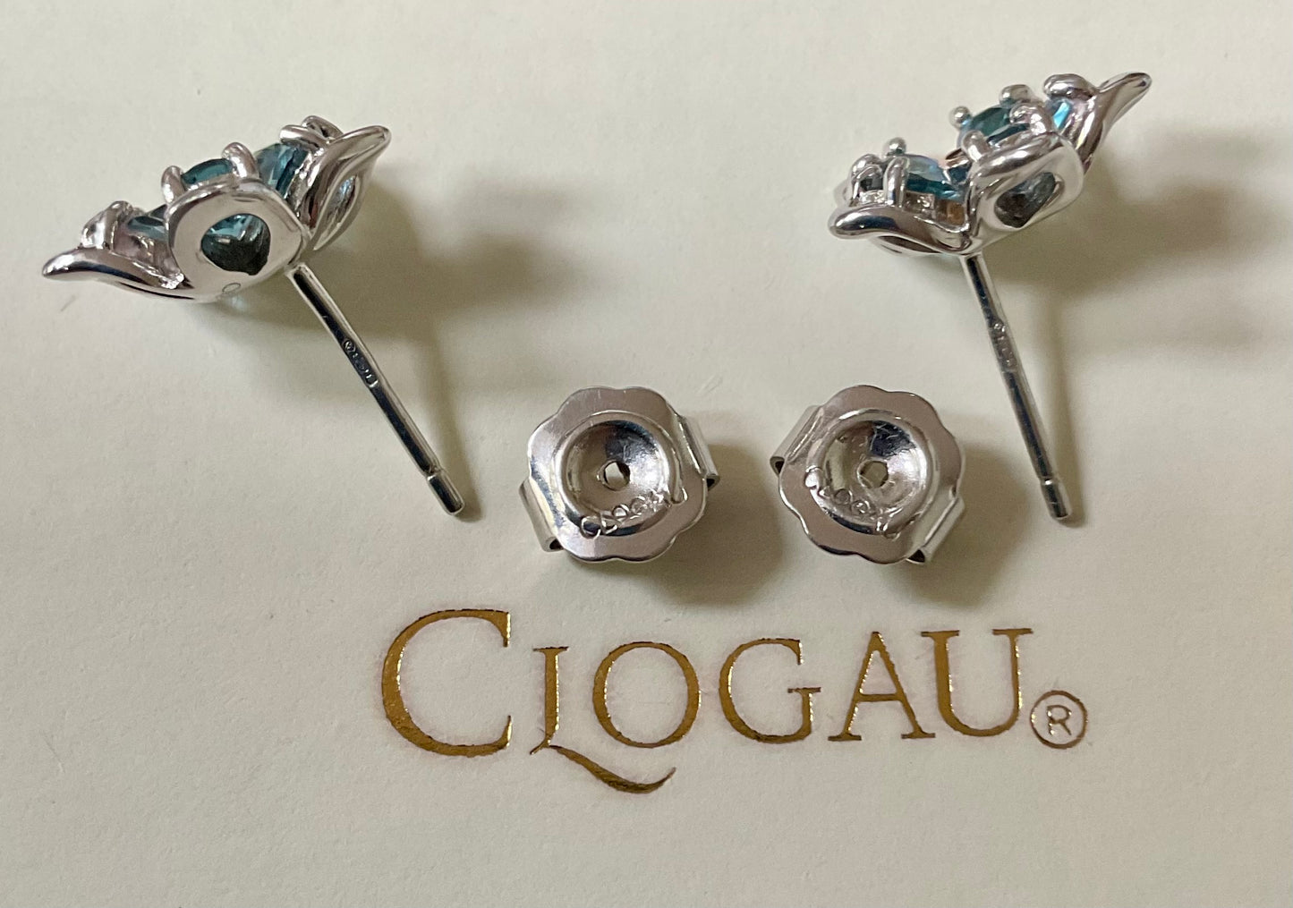 Clogau Forget Me Not Blue Topaz stud earrings in silver and rose gold