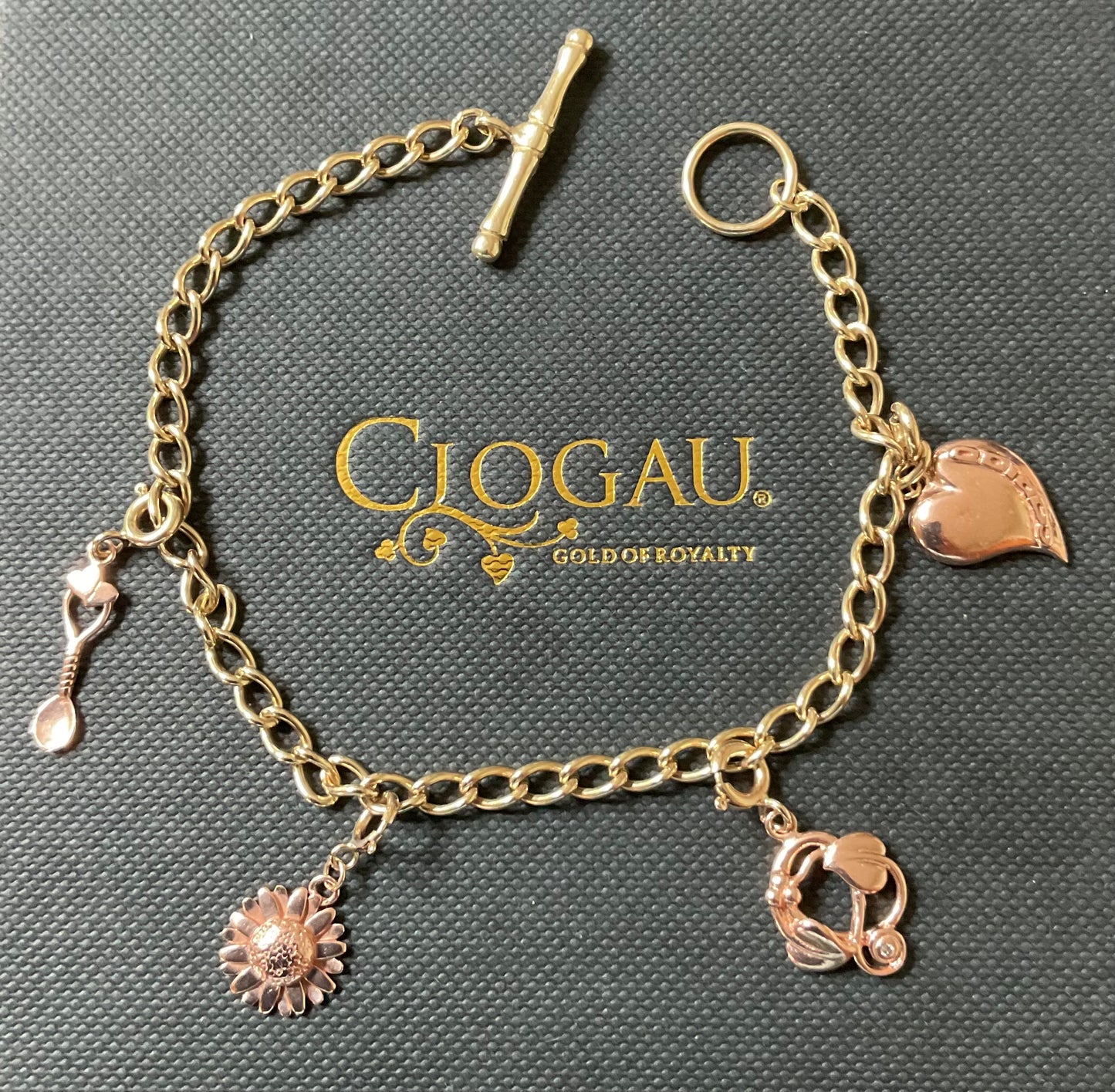 Vintage Clogau 9ct T-bar charm bracelet with 4 Clogau charms 19.5cm in yellow and rose gold