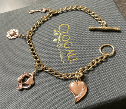 Vintage Clogau 9ct T-bar charm bracelet with 4 Clogau charms 19.5cm in yellow and rose gold