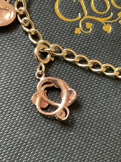 Vintage Clogau 9ct T-bar charm bracelet with 4 Clogau charms 19.5cm in yellow and rose gold
