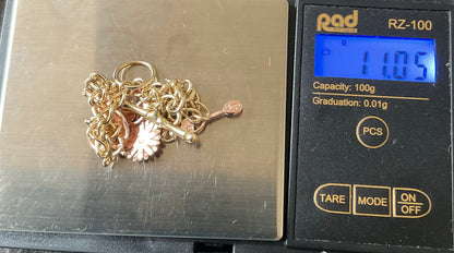 Vintage Clogau 9ct T-bar charm bracelet with 4 Clogau charms 19.5cm in yellow and rose gold