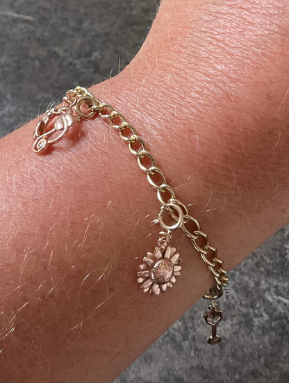 Vintage Clogau 9ct T-bar charm bracelet with 4 Clogau charms 19.5cm in yellow and rose gold