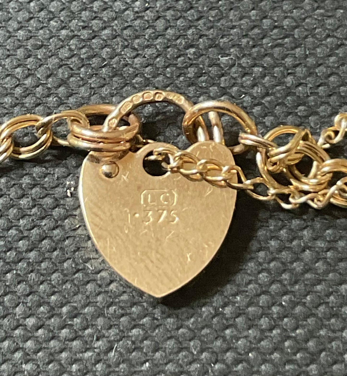 Vintage Clogau 9ct Cariad bracelet with safety padlock in yellow and rose gold