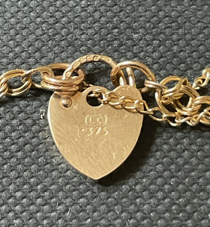 Vintage Clogau 9ct Cariad bracelet with safety padlock in yellow and rose gold