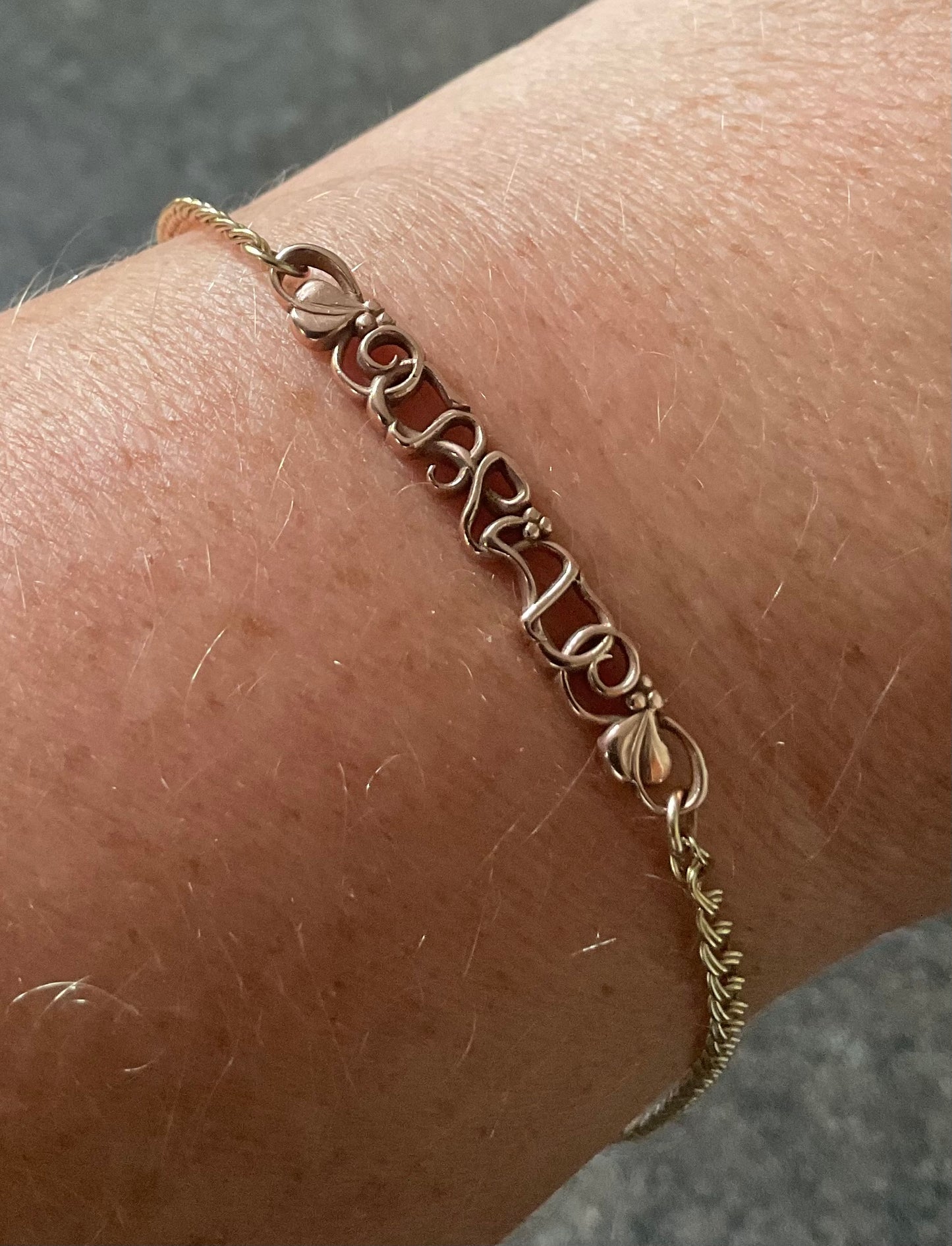 Vintage Clogau 9ct Cariad bracelet with safety padlock in yellow and rose gold