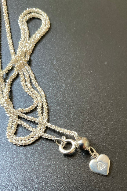925 Tanzanite and Zircon Cross pendant on 20” Italy 925 sparkle chain