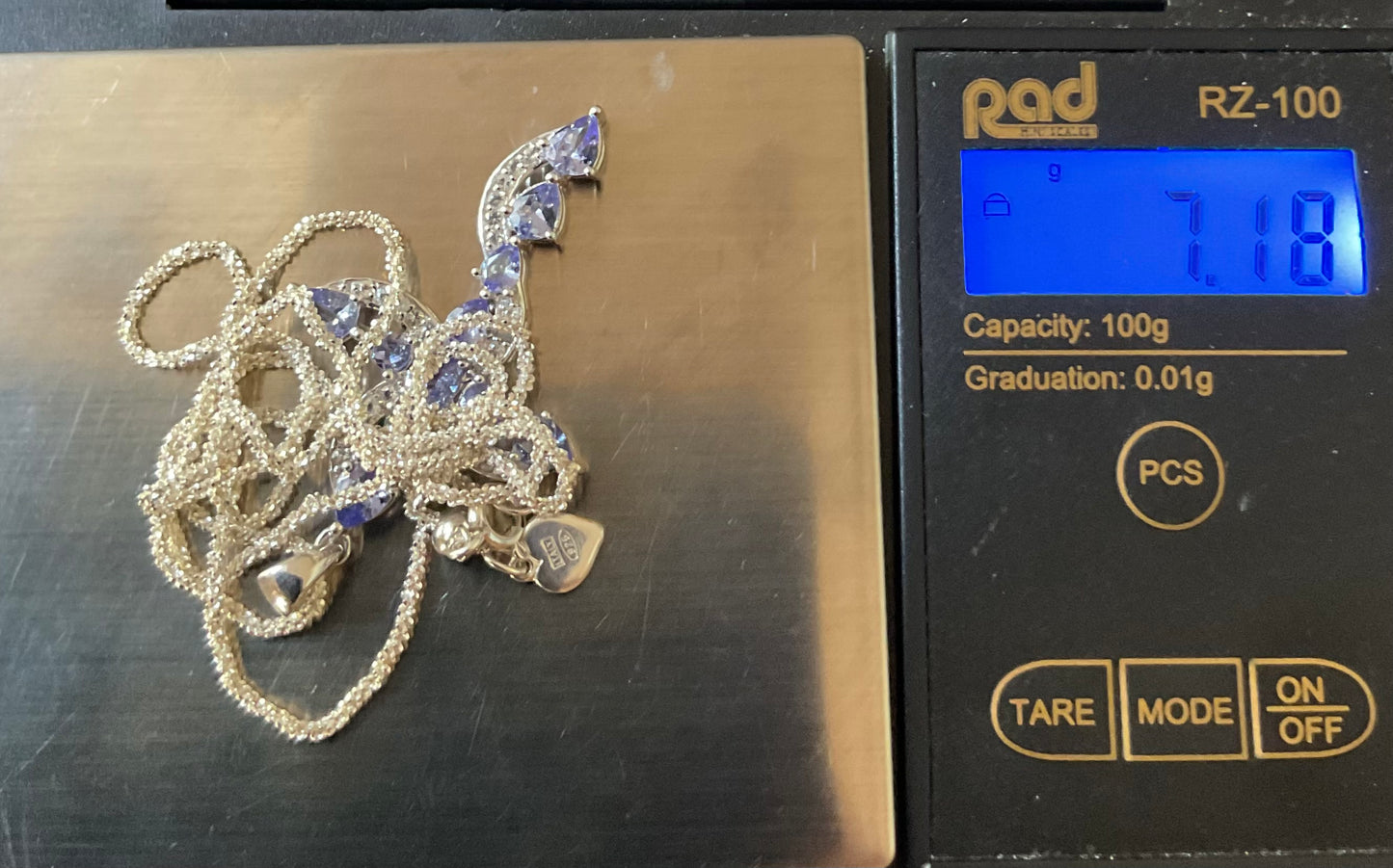 925 Tanzanite and Zircon Cross pendant on 20” Italy 925 sparkle chain